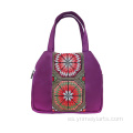 Cartera de mano con bordado étnico de nailon elegante